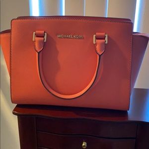 Michael kors pink purse with gold accents